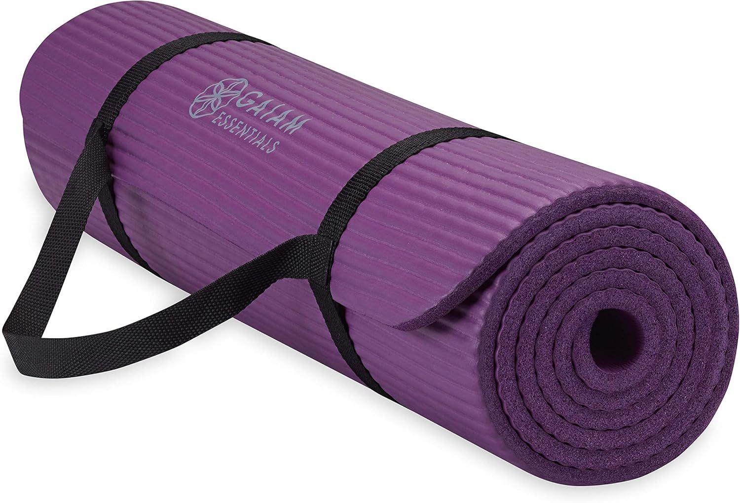 Shows the core product clearly - a rolled purple yoga mat with integrated carrying straps, allowing shoppers to see the product design, color, branding, and portability feature. Uses a subtle drop…