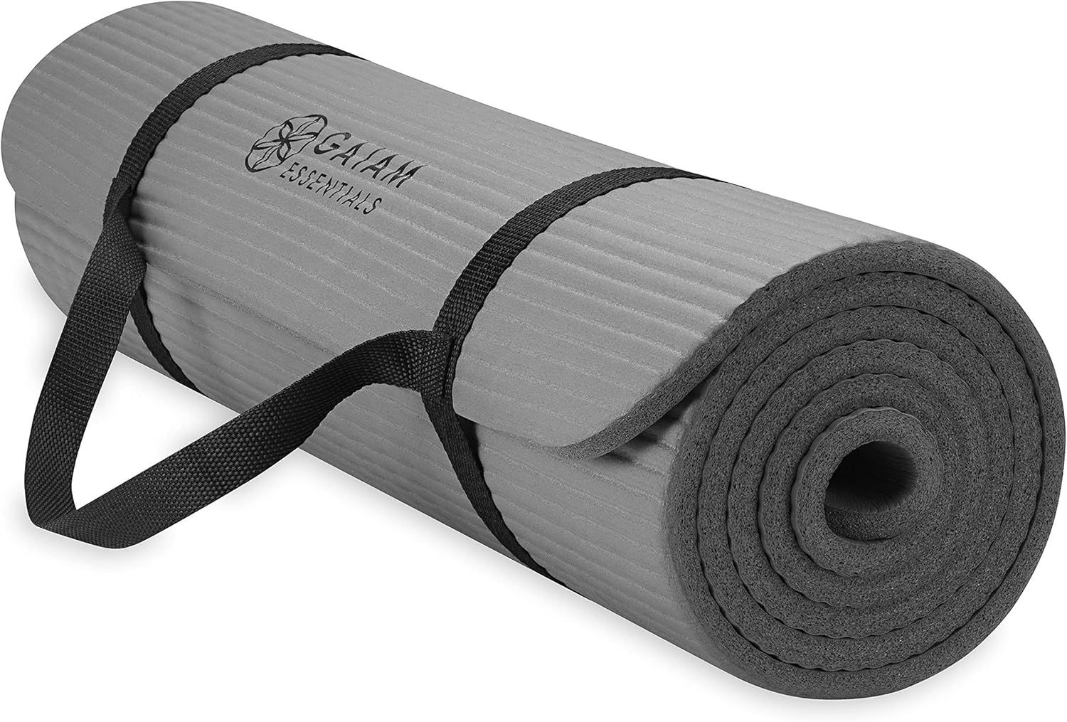 Shows the core product clearly - a rolled exercise mat with integrated carrying straps - allowing shoppers to see the product's form, texture, branding, and portability features. Demonstrates that…
