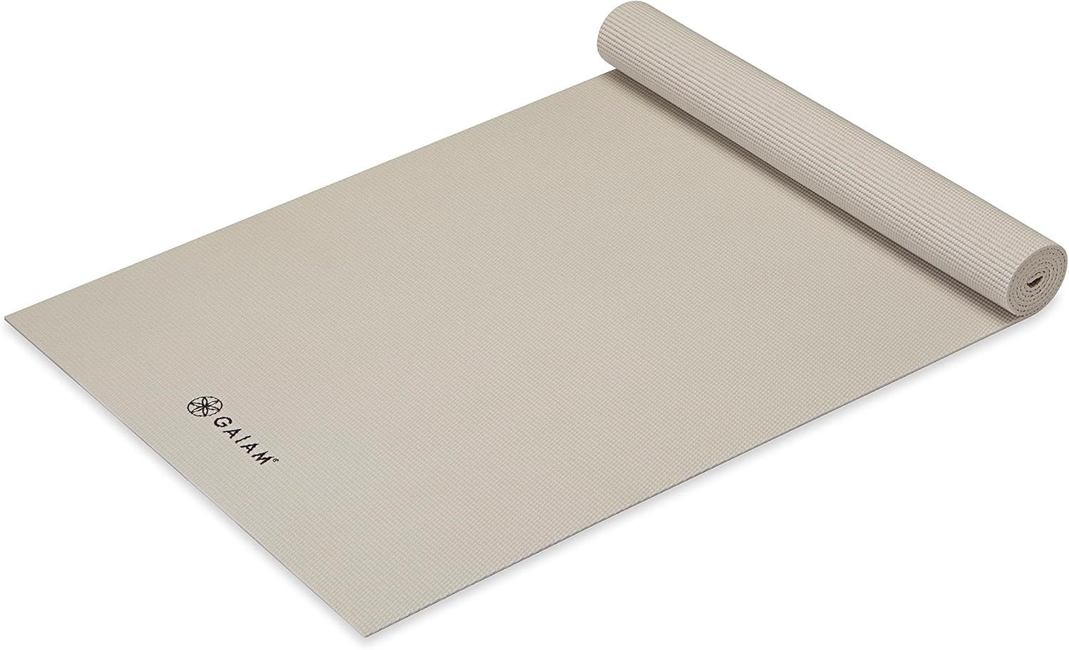Shows the core yoga mat product in a partially rolled state to communicate its texture, material quality, and rollable portability feature. Demonstrates the mat's rollable functionality, showing how…