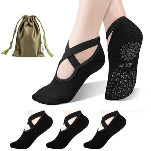 Shows the core product—yoga/pilates grip socks with cross-strap design and non-slip sole—to communicate the product's style, functionality, and included storage pouch. Highlights that the purchase…