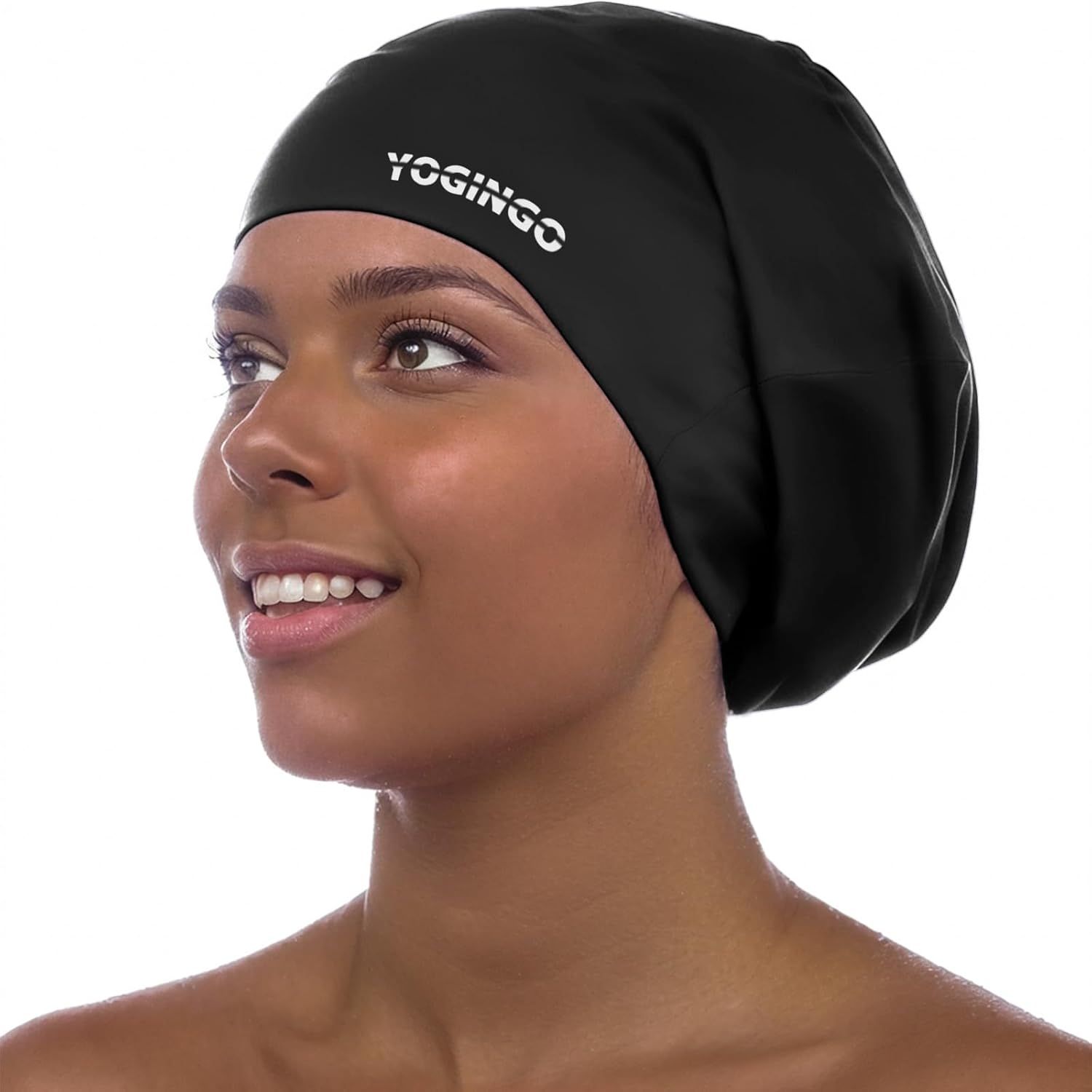 Shows the swim cap being worn by a model to demonstrate fit, coverage, and how it looks when in use, helping shoppers visualize the product on themselves. Uses a human model to show how the swim cap…