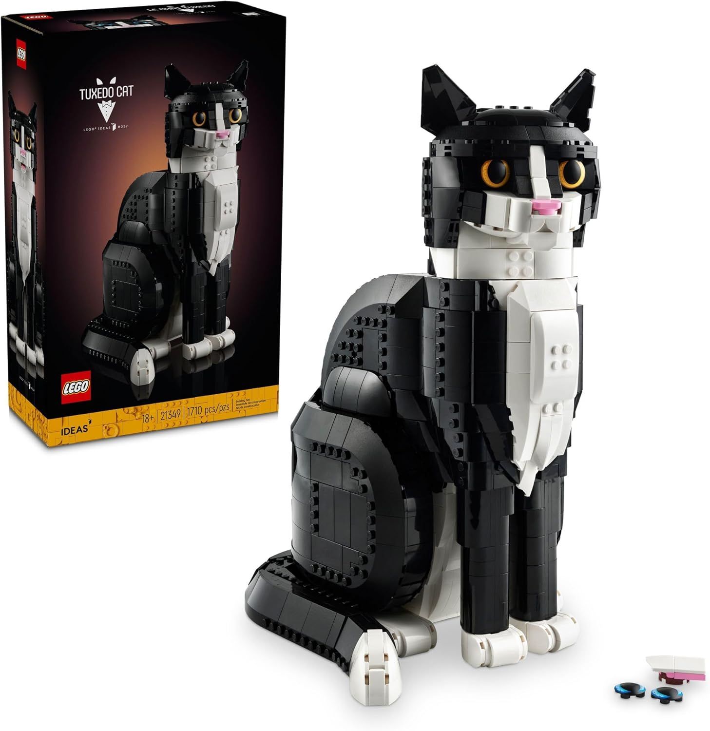 Shows the completed LEGO Tuxedo Cat model alongside its retail packaging to communicate what the buyer receives and what they can build. Displays the official LEGO Ideas packaging to reassure…