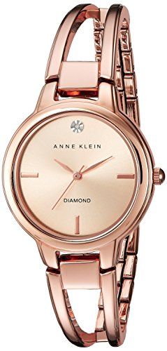 Displays the core product, an Anne Klein rose gold watch, in a clean catalog style to show the elegant design, dial details, and bracelet construction clearly to shoppers.