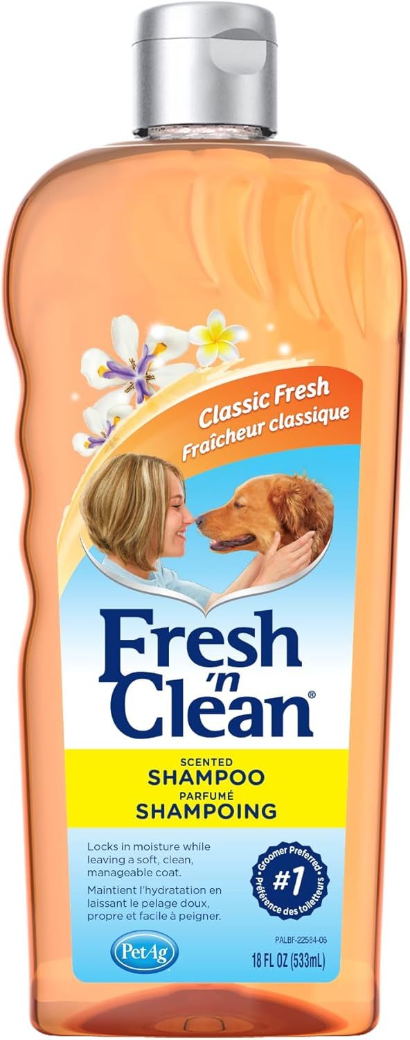 Shows the core product—a bottle of Fresh 'n Clean scented dog shampoo—clearly displayed to communicate the brand, scent variant, and product type to shoppers. Displays the actual retail packaging…