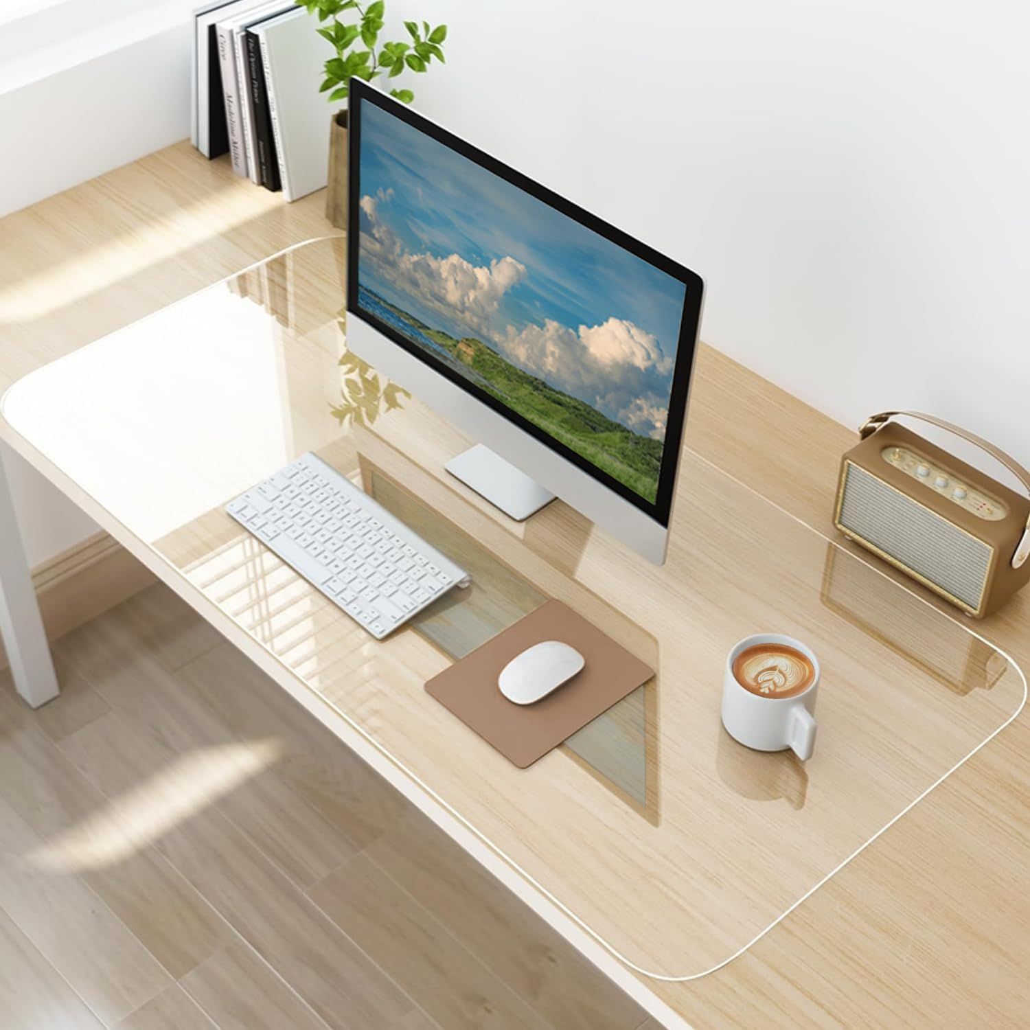 Shows the product in a real-world home office environment to help shoppers visualize how it fits into their workspace and daily life. Displays the core sellable product, a transparent desk mat,…