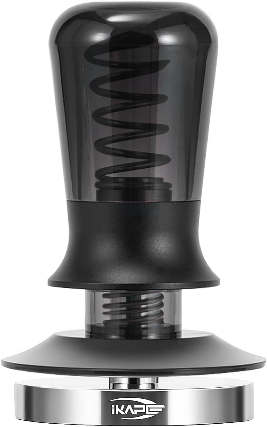 Shows the core product with a transparent housing that reveals the internal spring mechanism, communicating quality construction and the functional design of this coffee tamper.