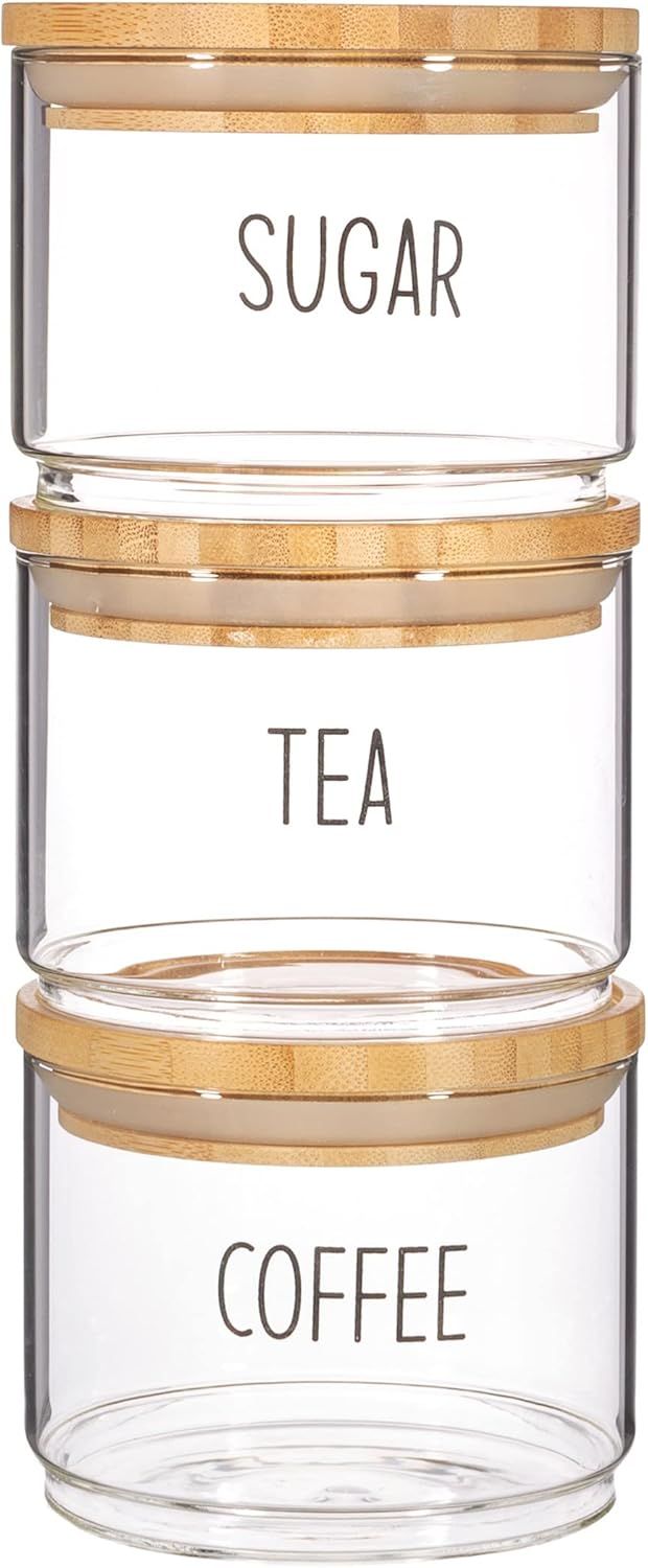 Displays the core product—a set of three stackable glass storage canisters with bamboo lids labeled for sugar, tea, and coffee—to show shoppers exactly what they will receive and how the canisters…