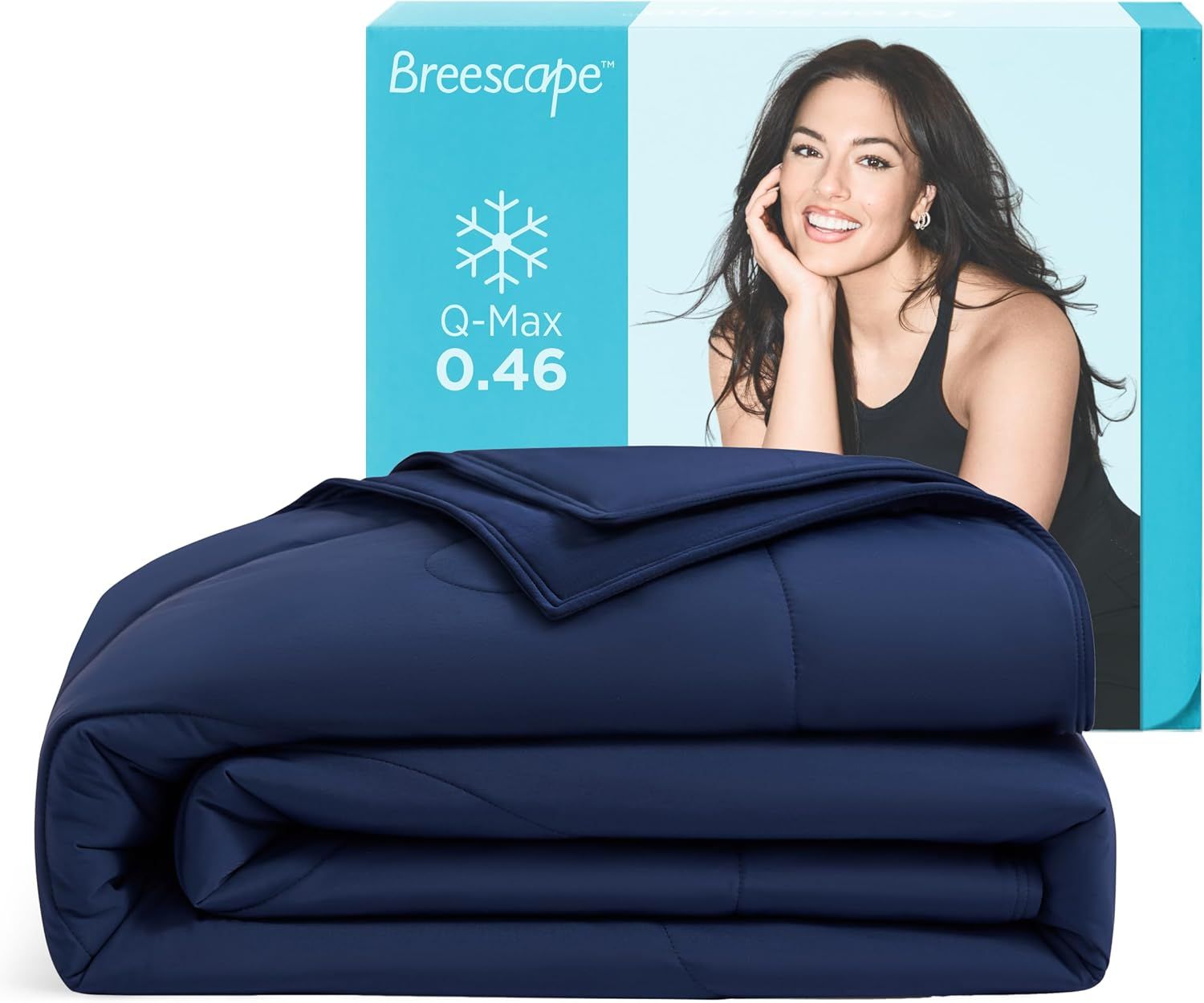 Displays the core product, a navy blue comforter or duvet, with packaging that highlights its cooling technology feature (Q-Max 0.46) to communicate temperature regulation benefits to shoppers.…