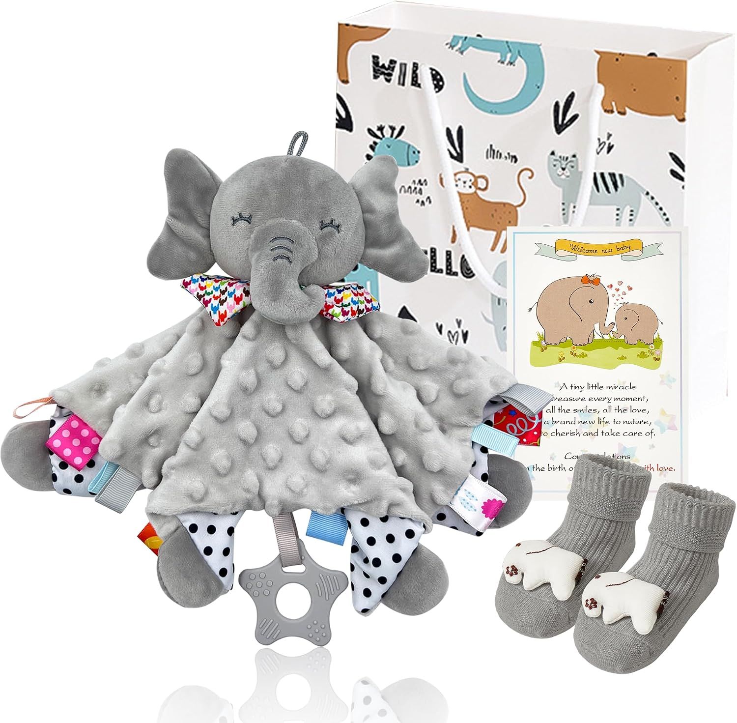 Displays the complete baby gift set including elephant lovey, teether, socks, greeting card, and gift box to show shoppers everything included in the purchase. Shows all the included accessories and…