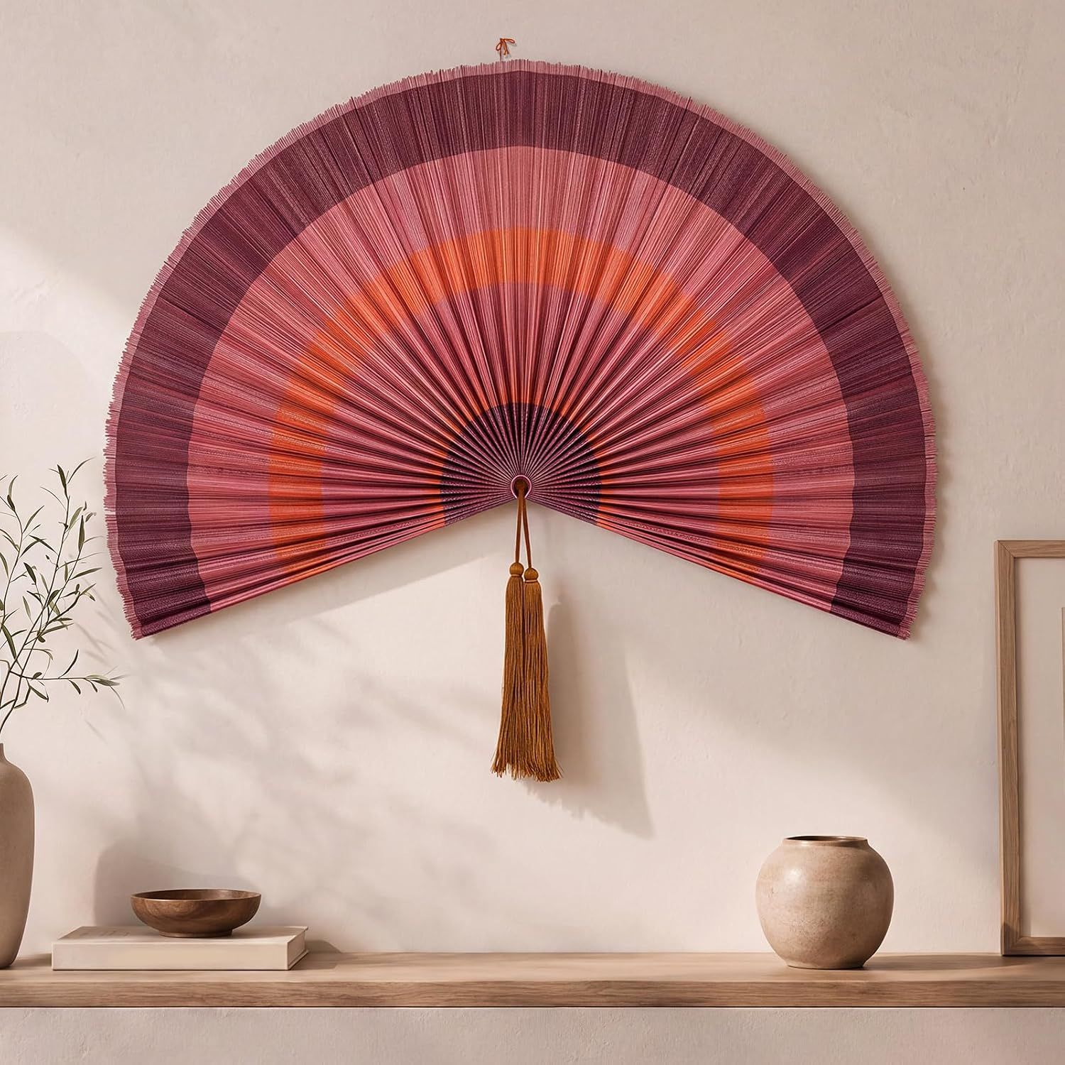 Shows the decorative fan displayed in a styled home environment to help shoppers visualize how the product will look as wall decor in their own space. Displays the core product with its distinctive…