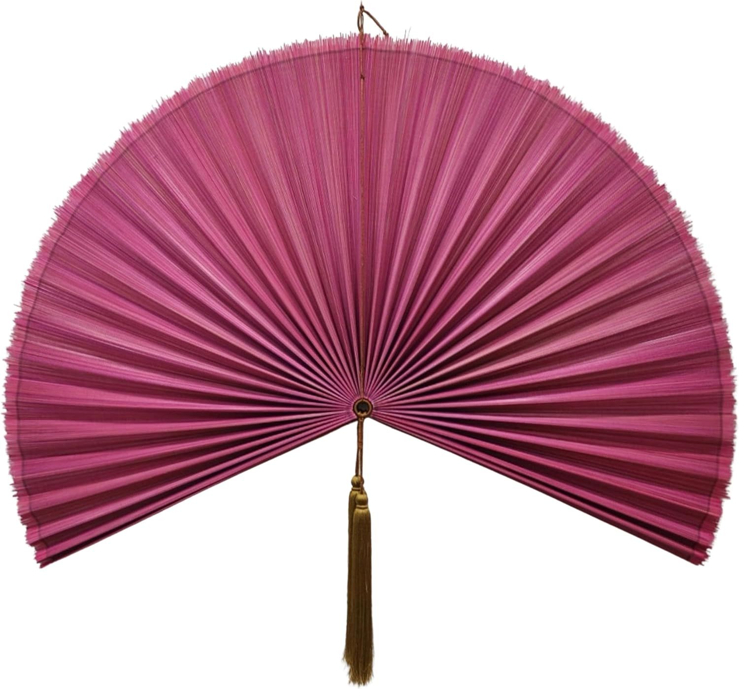 Displays the core product clearly on a white background to show the fan's distinctive pink pleated design, decorative tassel, and overall form for catalog presentation. Shows the fan in its fully…