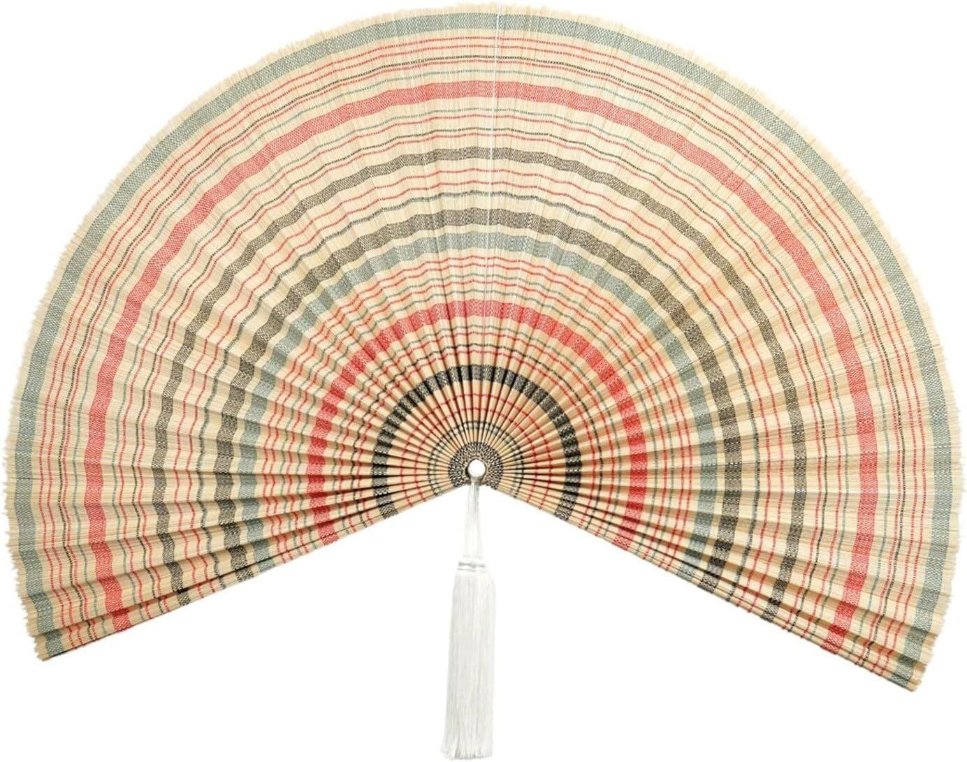 Displays the core product, a decorative hand fan with a distinctive striped pattern in muted colors, allowing shoppers to clearly see the design, colors, and craftsmanship of the item.