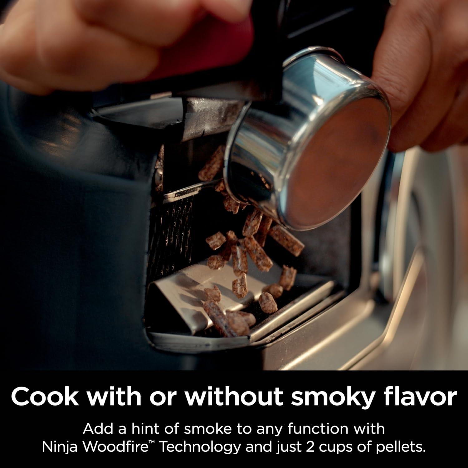 Highlights the ability to add a smoky flavor to cooking by using the Ninja Woodfire Technology and wood pellets.