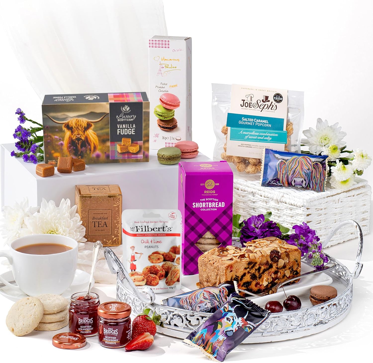 Shows the various food products and treats included in a gift basket or bundle.