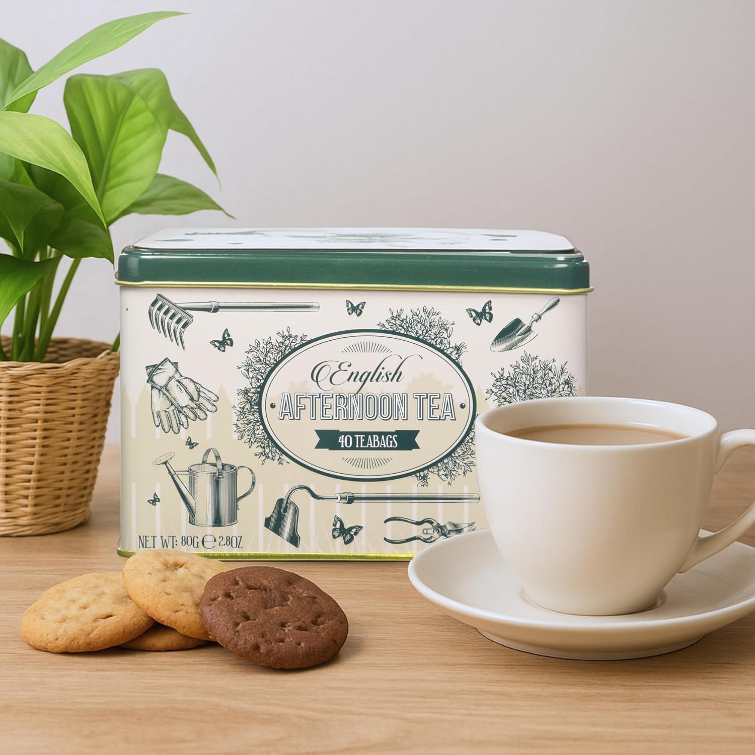 Shows the tea product in a lifestyle setting with a cup of tea and cookies, conveying the experience of enjoying an English afternoon tea.