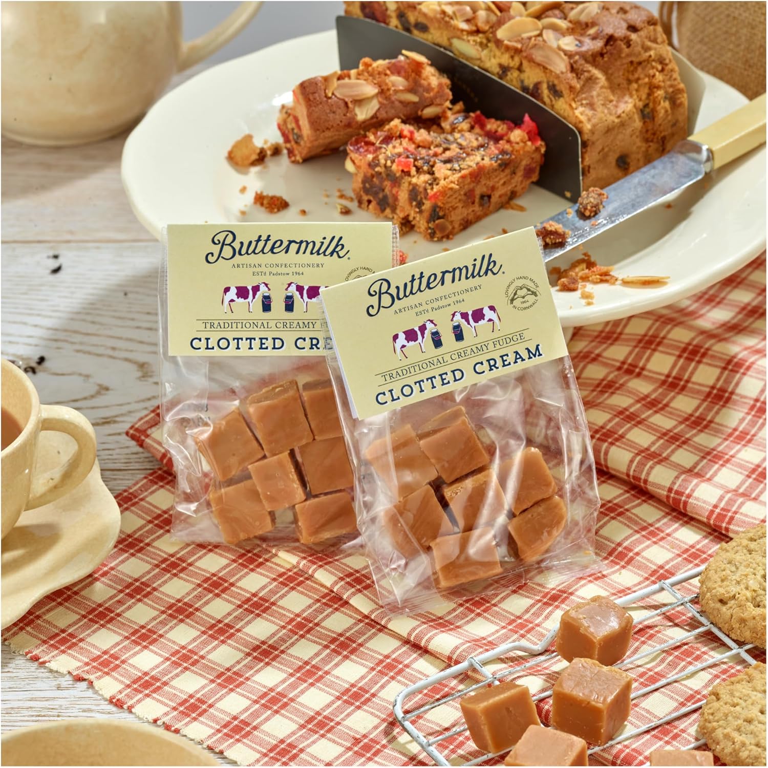 Shows the different components included when purchasing the product, including clotted cream fudge and packages of clotted cream.