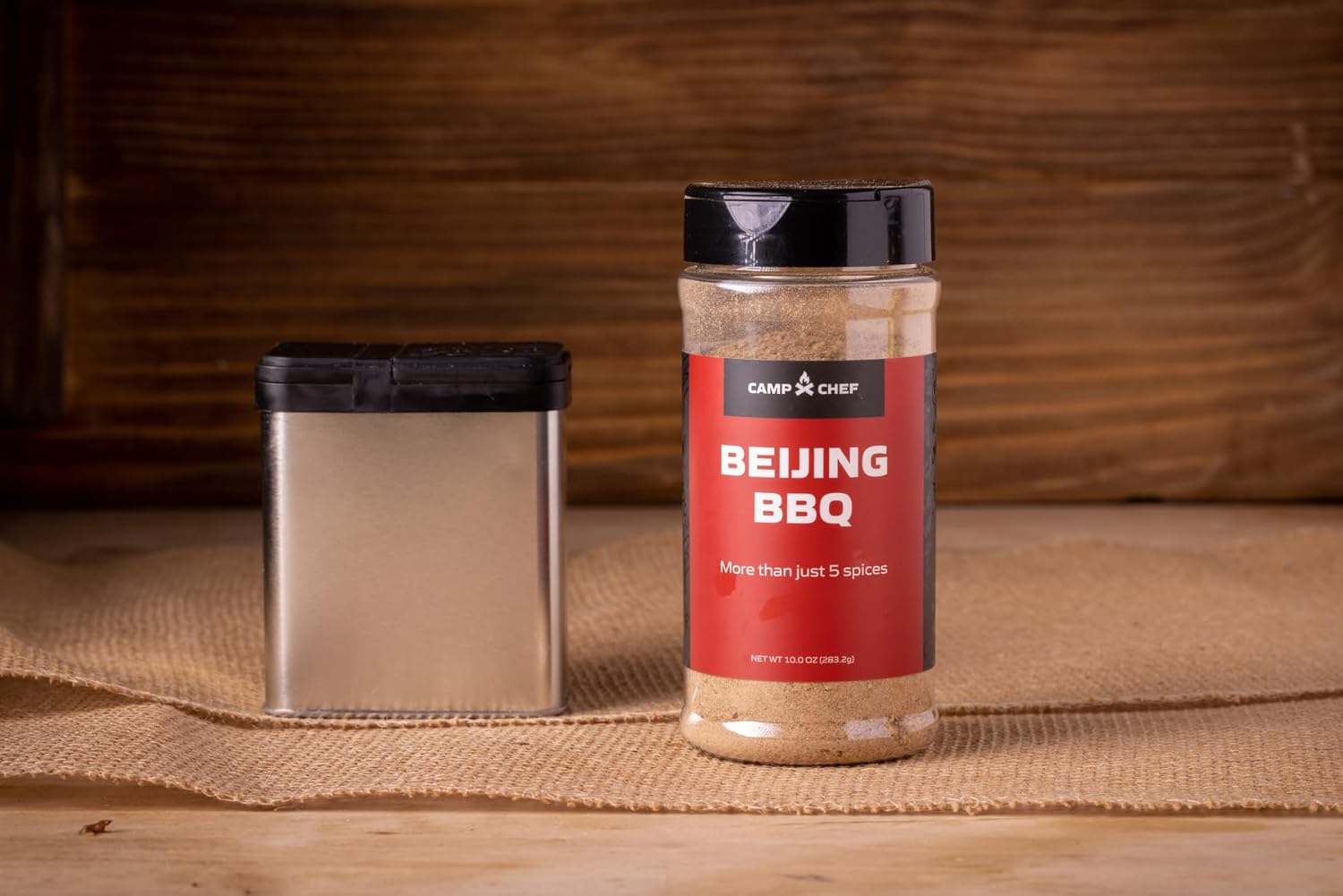 Shows the spice blend product and included storage container to highlight what is included in the purchase.