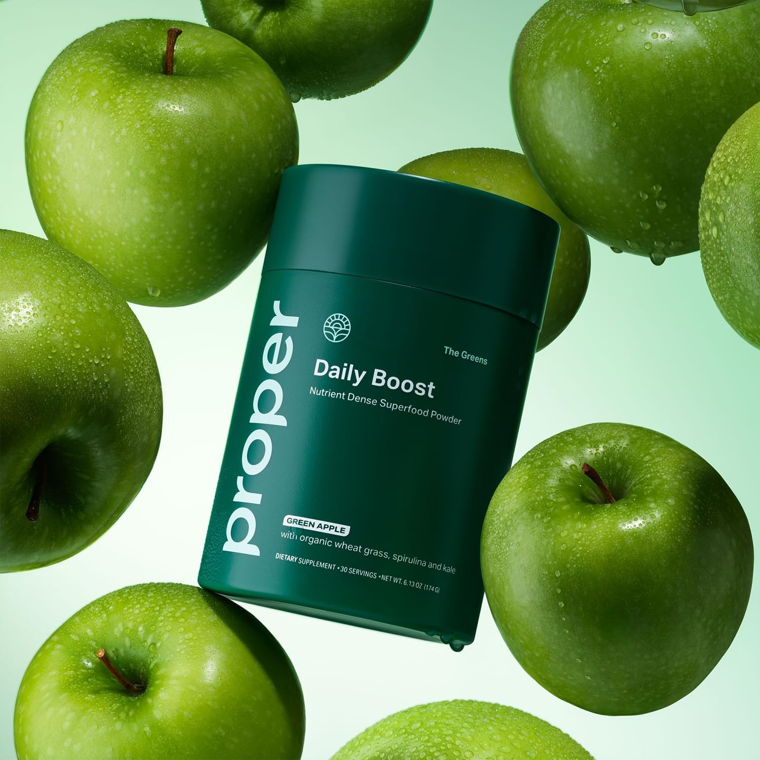 Highlights the green apple flavor of the Daily Boost supplement powder, associating it with fresh, natural ingredients.