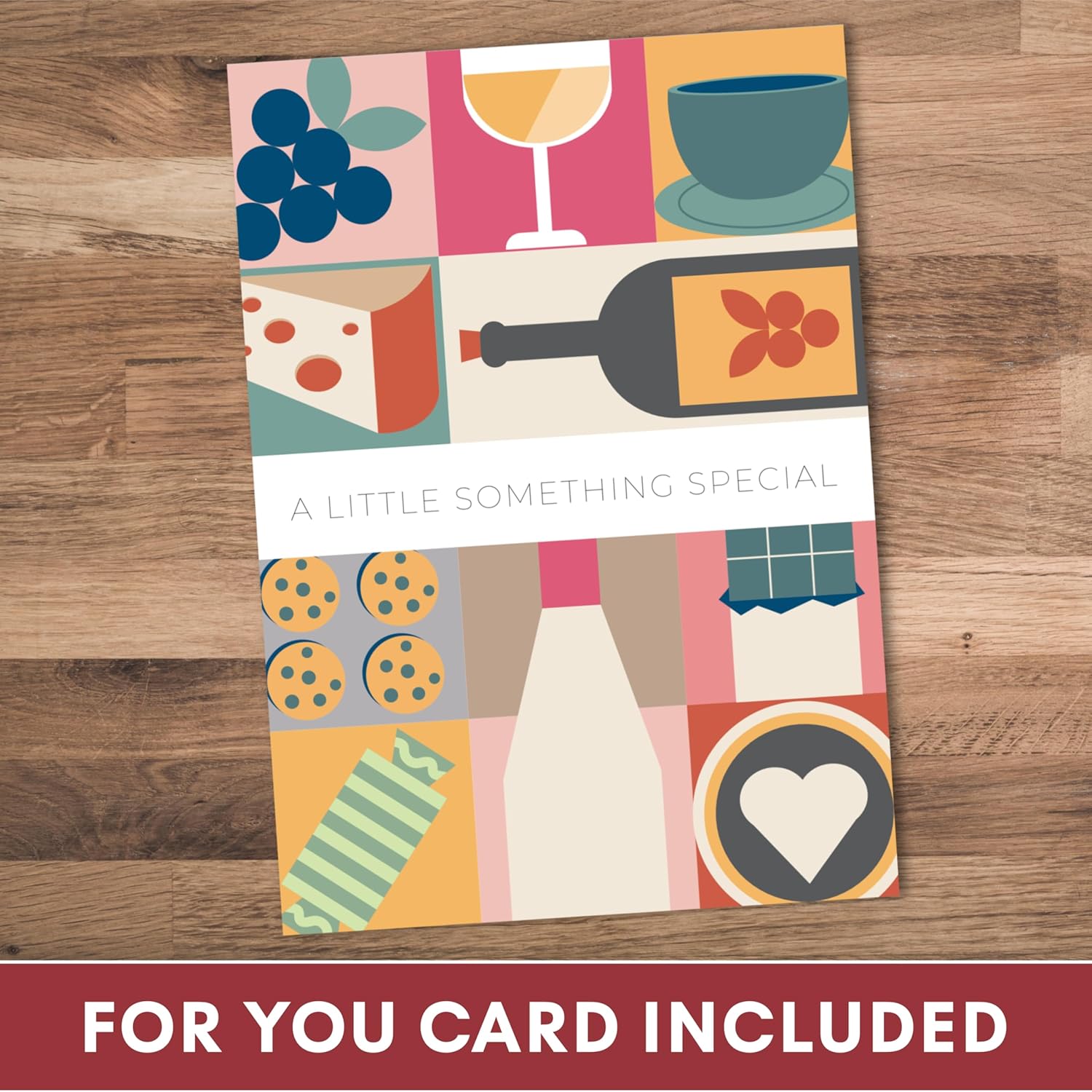 Shows the various items included in this gift set, such as a wine bottle, snacks, and a greeting card.