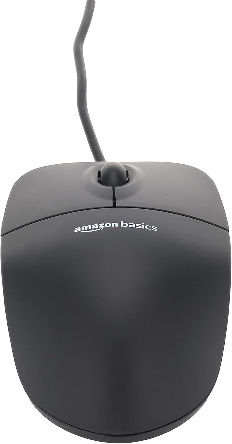 Shows the product, an Amazon Basics computer mouse, in a simple lifestyle context without any additional text or feature callouts.