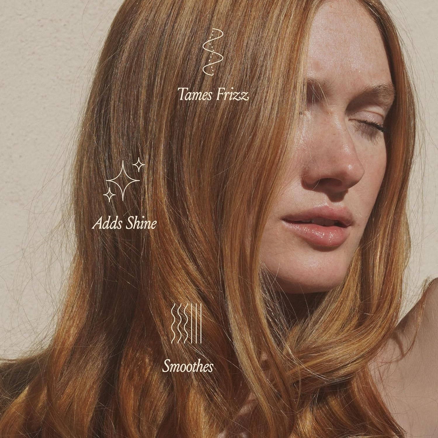 Highlights the key benefits of the hair product - adding shine and smoothing hair.