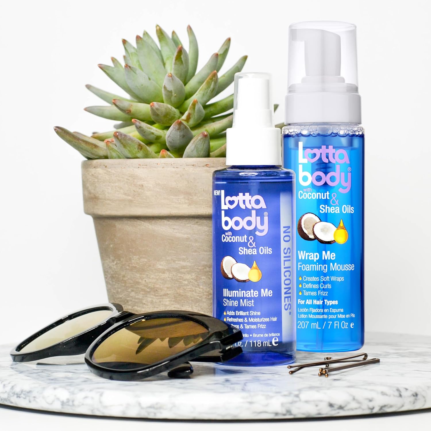 Shows the different hair care products included in the Lottabody Coconut & Shea Oils line, highlighting the key ingredients.