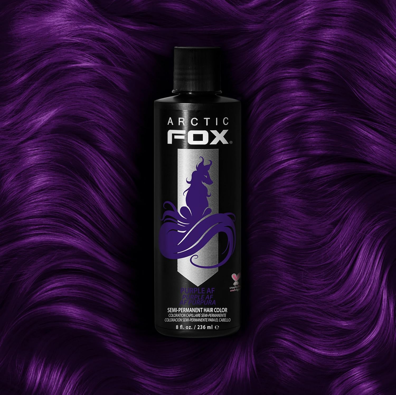 Emphasizes the Arctic Fox brand identity and product through the prominent logo and vibrant purple hair color.