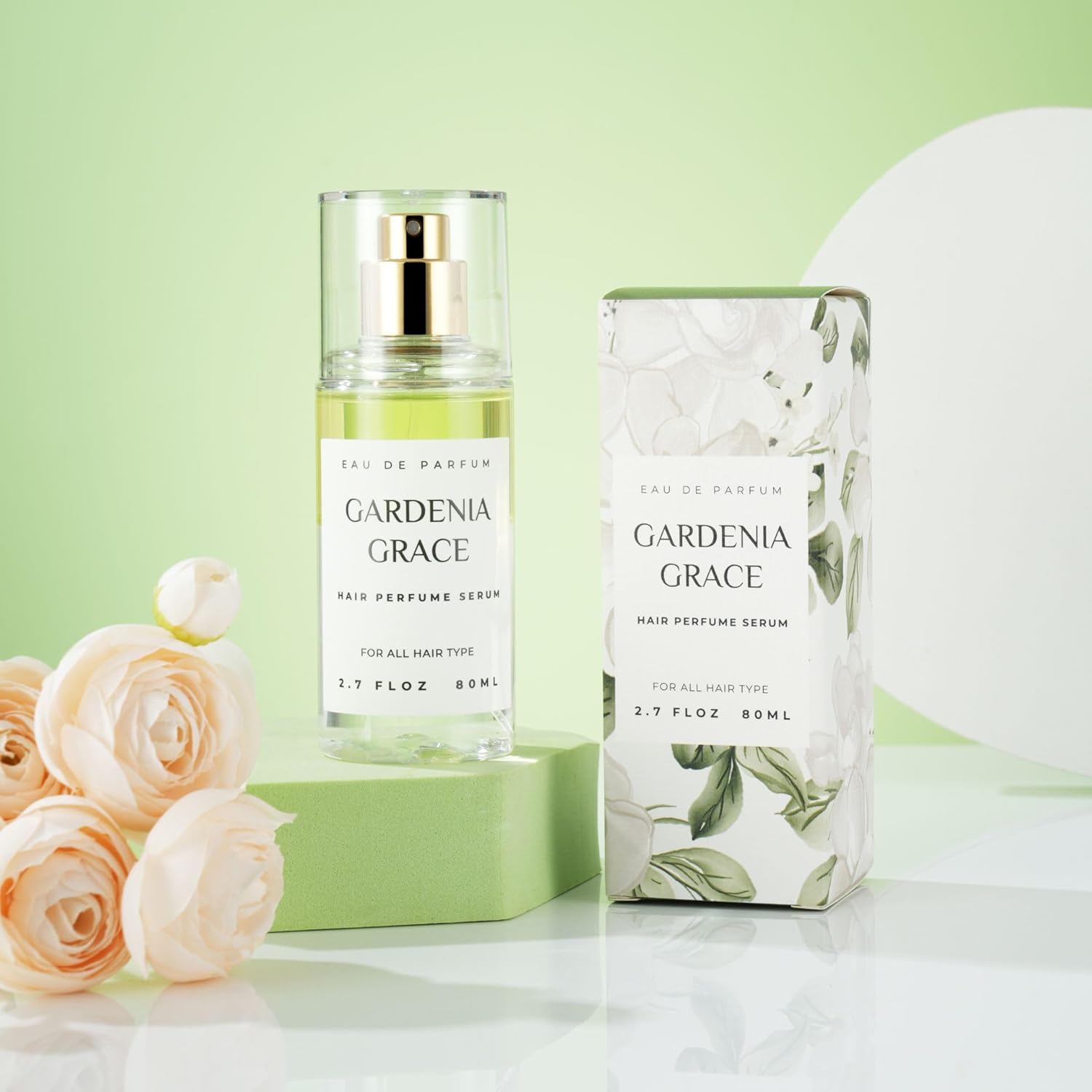 Shows the hair perfume serum product and its packaging to illustrate what is included when purchasing.