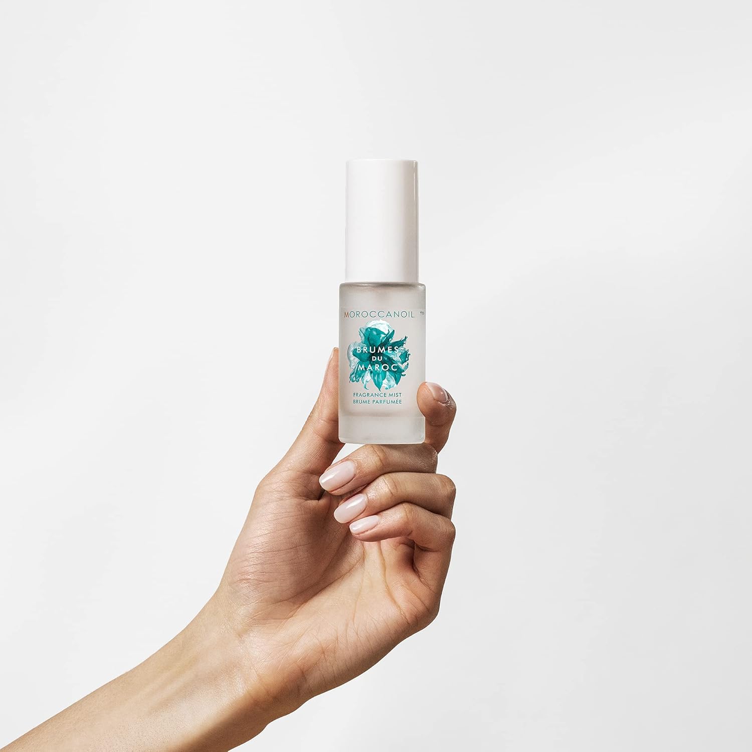 Shows the product being held in a real-world setting, creating a relatable and authentic feel.
