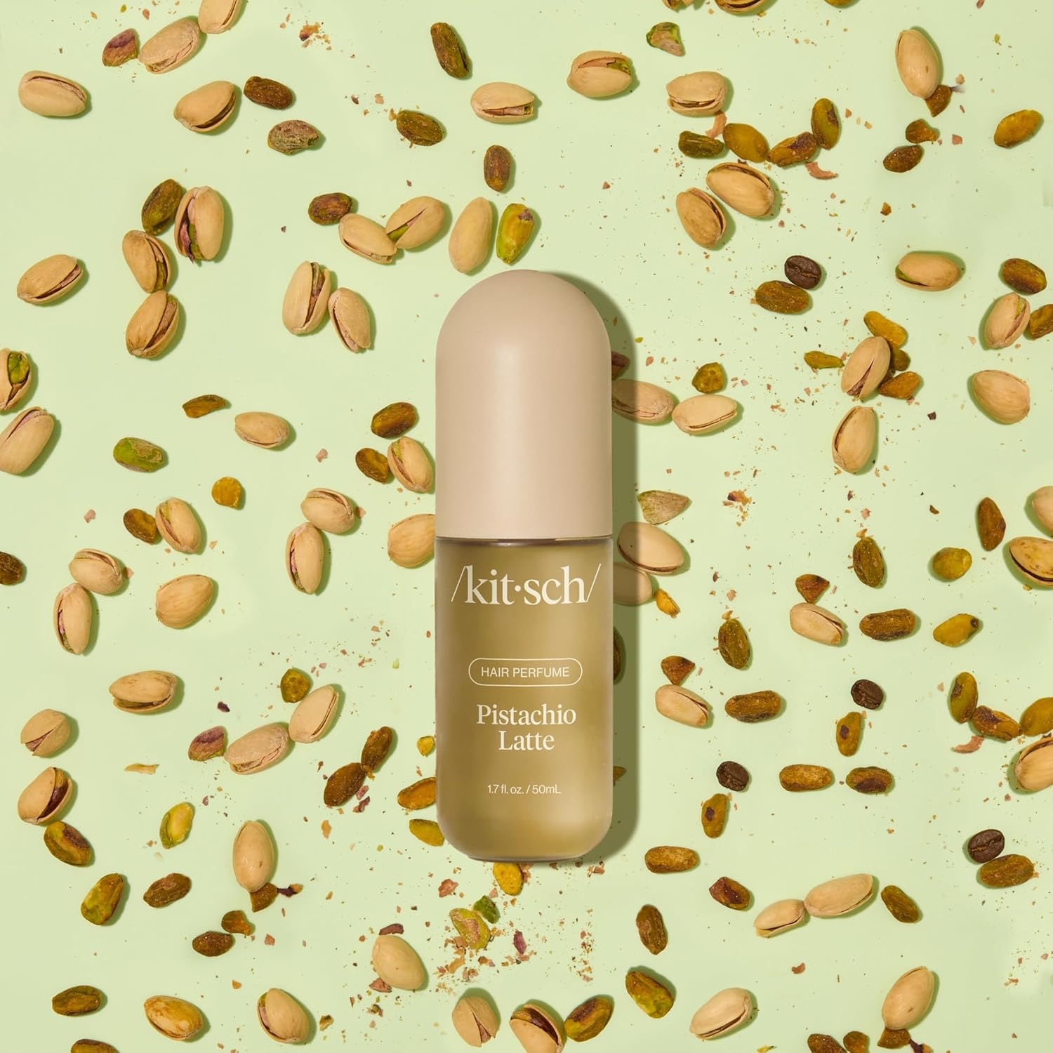 Highlights the pistachio latte scent of the hair perfume product.