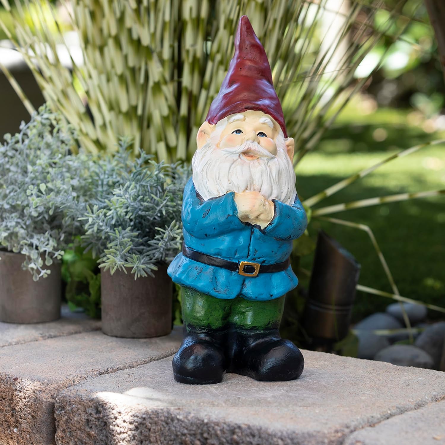 Shows the product in a realistic outdoor setting to demonstrate how it can be used as a decorative element in gardens or patios.