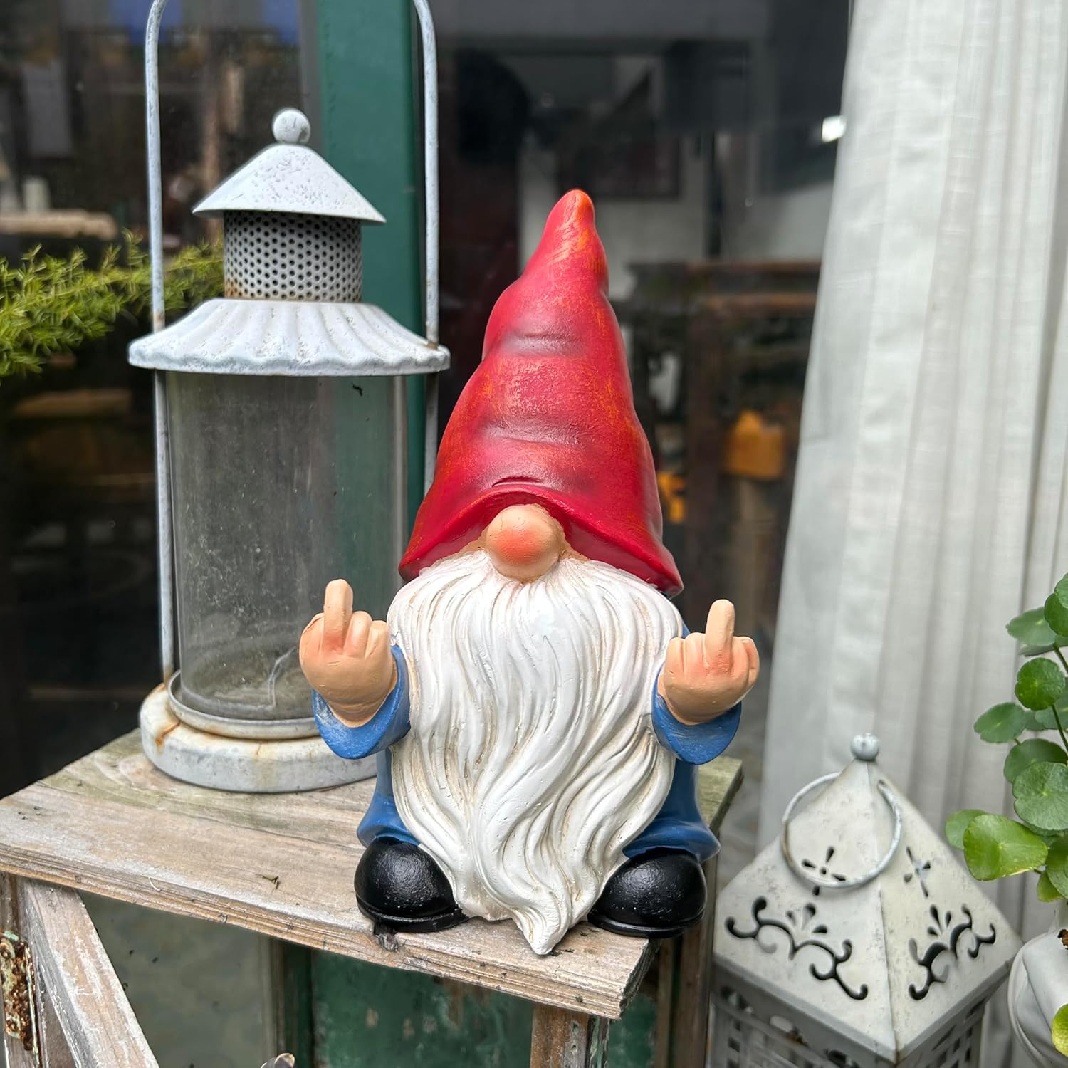 Shows the product in a realistic outdoor setting to demonstrate how it can be used as a decorative element in gardens or patios.