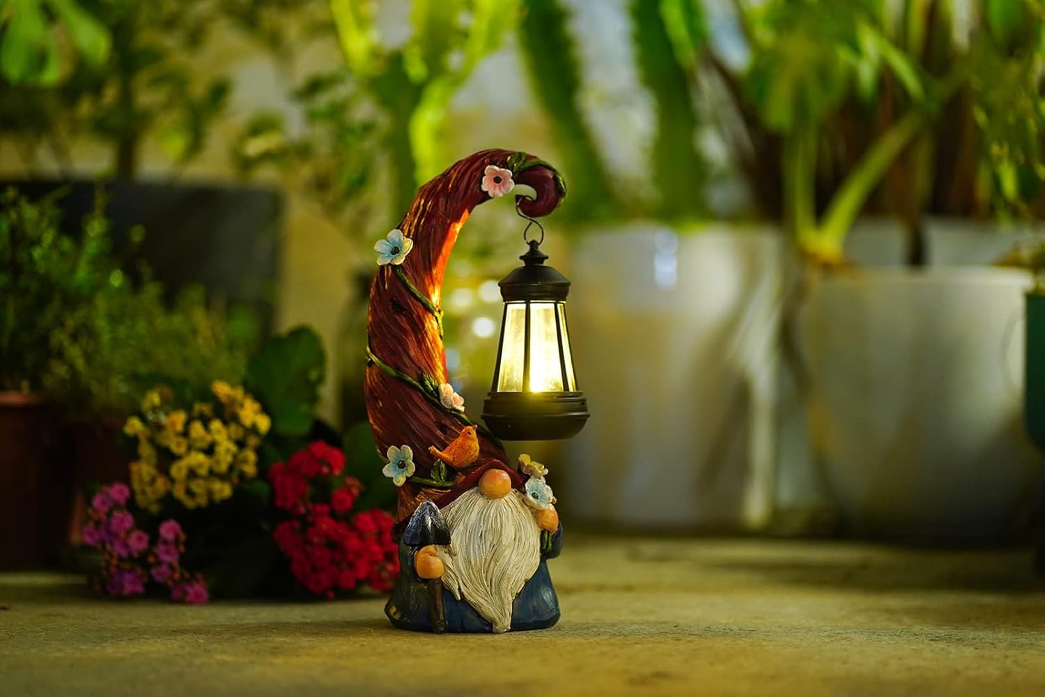 Showcases the product in a realistic garden setting to demonstrate its decorative appeal and functionality as an outdoor light fixture.