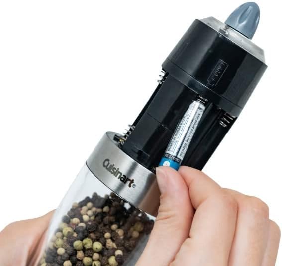 Demonstrates how to insert batteries into the product, helping customers understand the setup process.