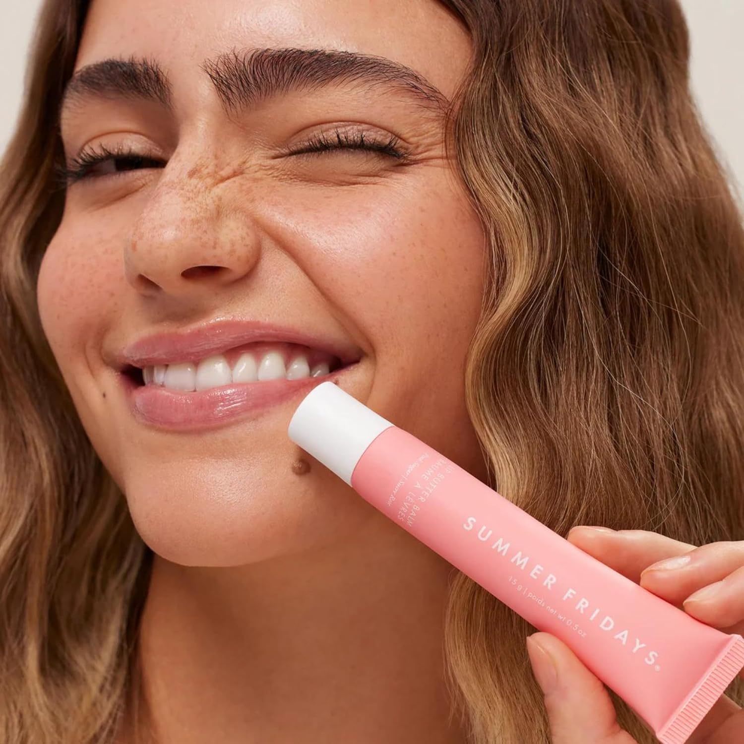Demonstrates the simplicity of applying the lip product, emphasizing its user-friendly nature.
