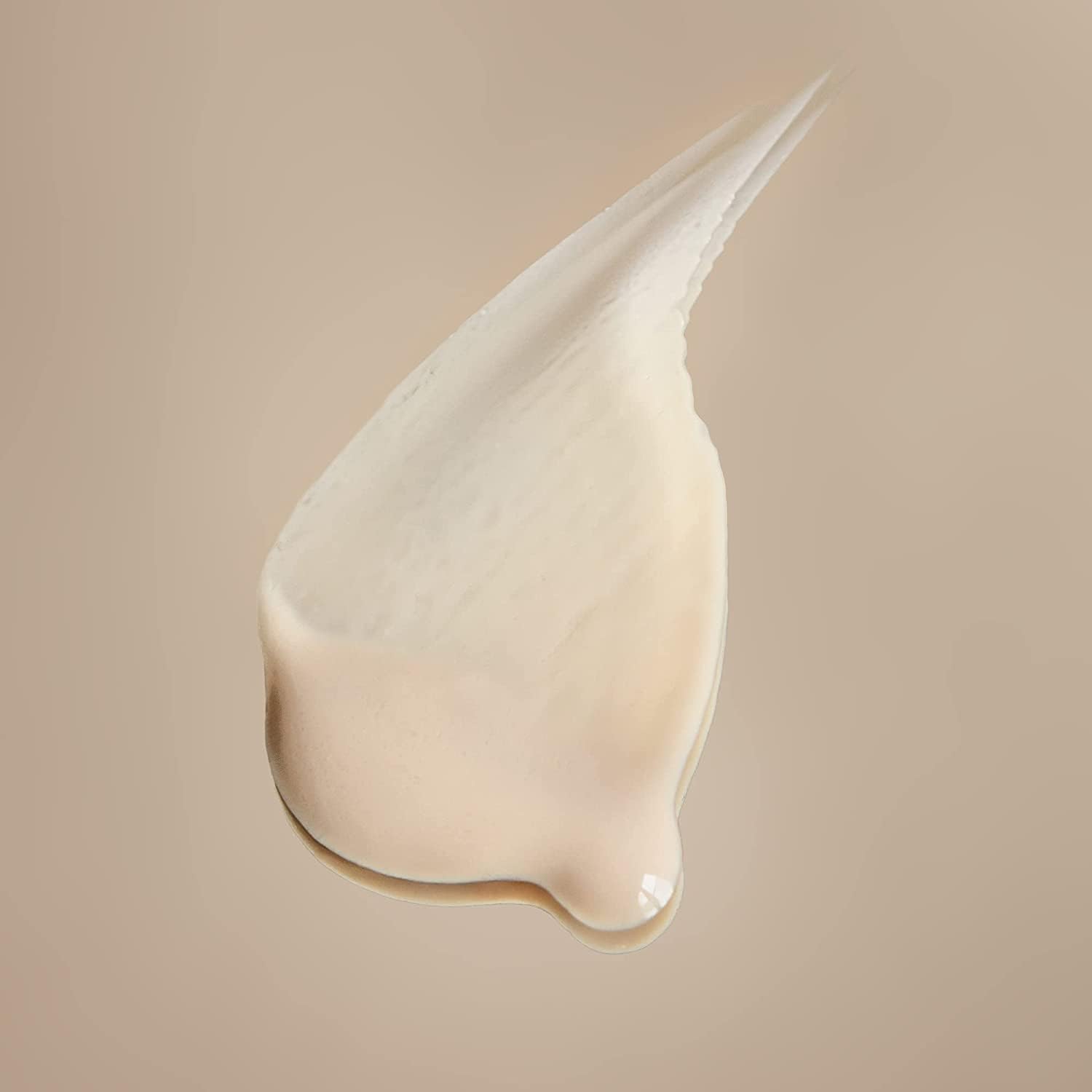 Showcases the creamy, smooth texture of the product to highlight its quality and ease of application.
