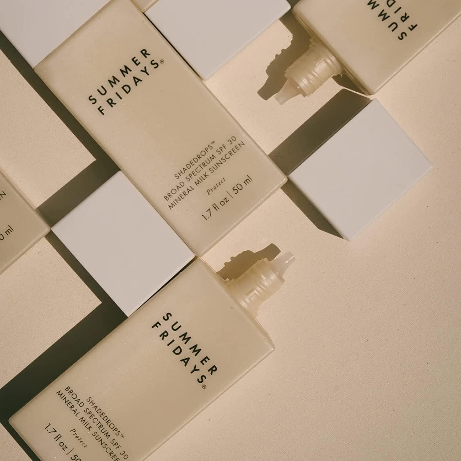 Showcases the product packaging and bottle design to familiarize customers with the appearance of the sunscreen they'll receive.