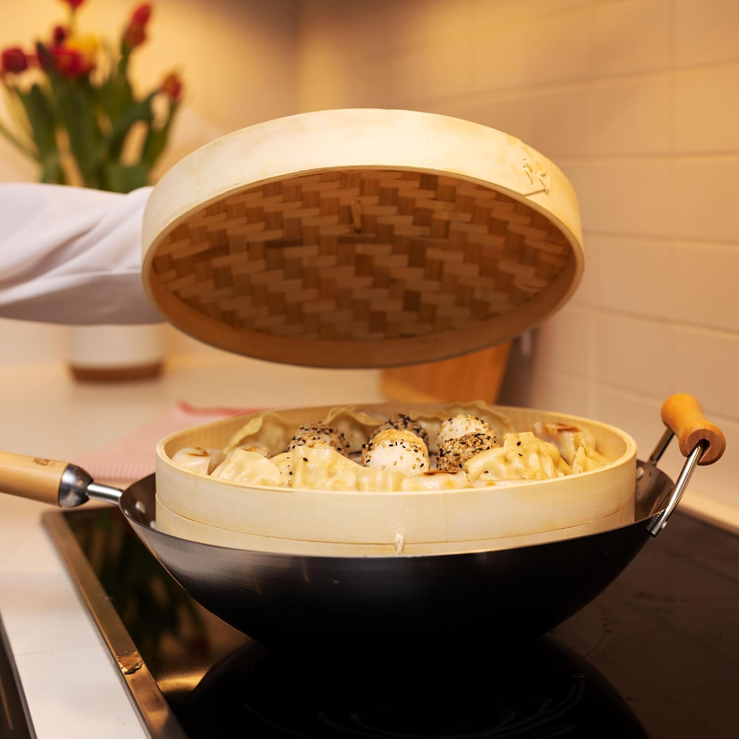 Shows the product being used in a real kitchen setting, demonstrating its practical application for cooking and serving food.