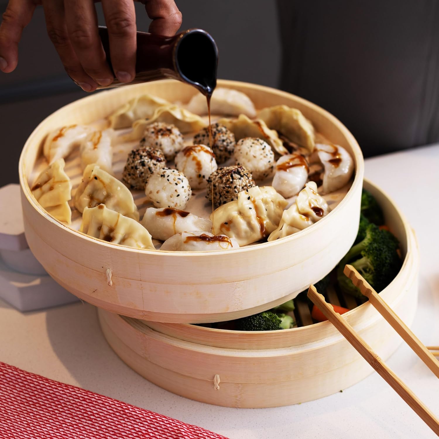 Shows the product being used to serve and present a variety of dumplings, demonstrating its functionality and appeal in a real-world dining context.
