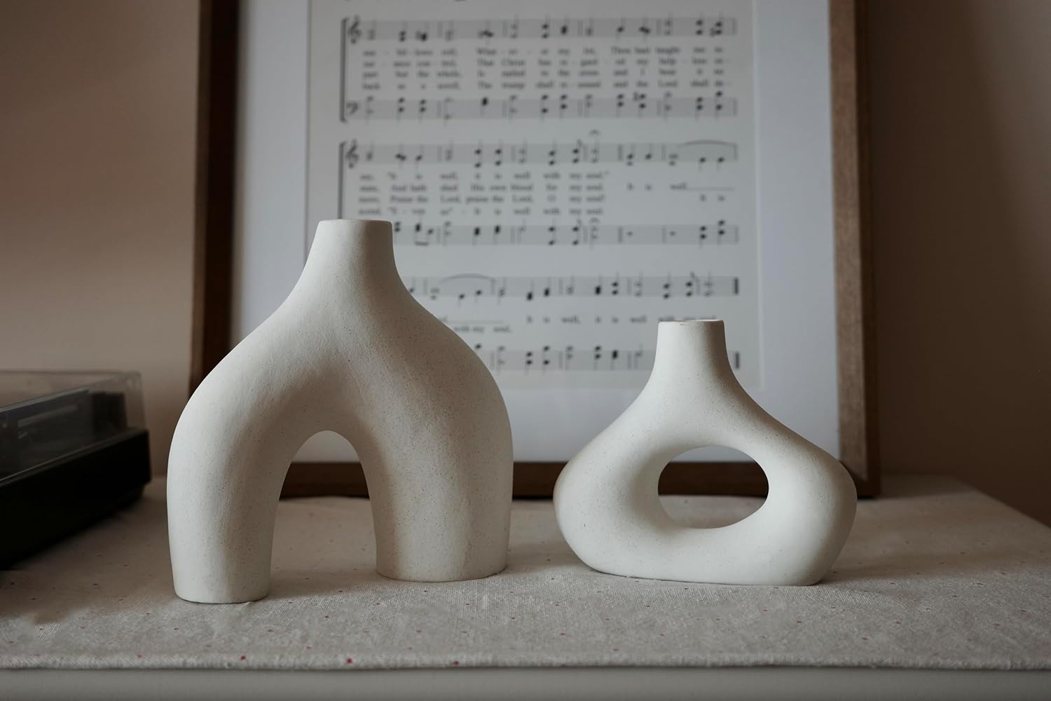 Showcases the product in a real-world context, demonstrating how it fits into a stylish, artistic home environment.