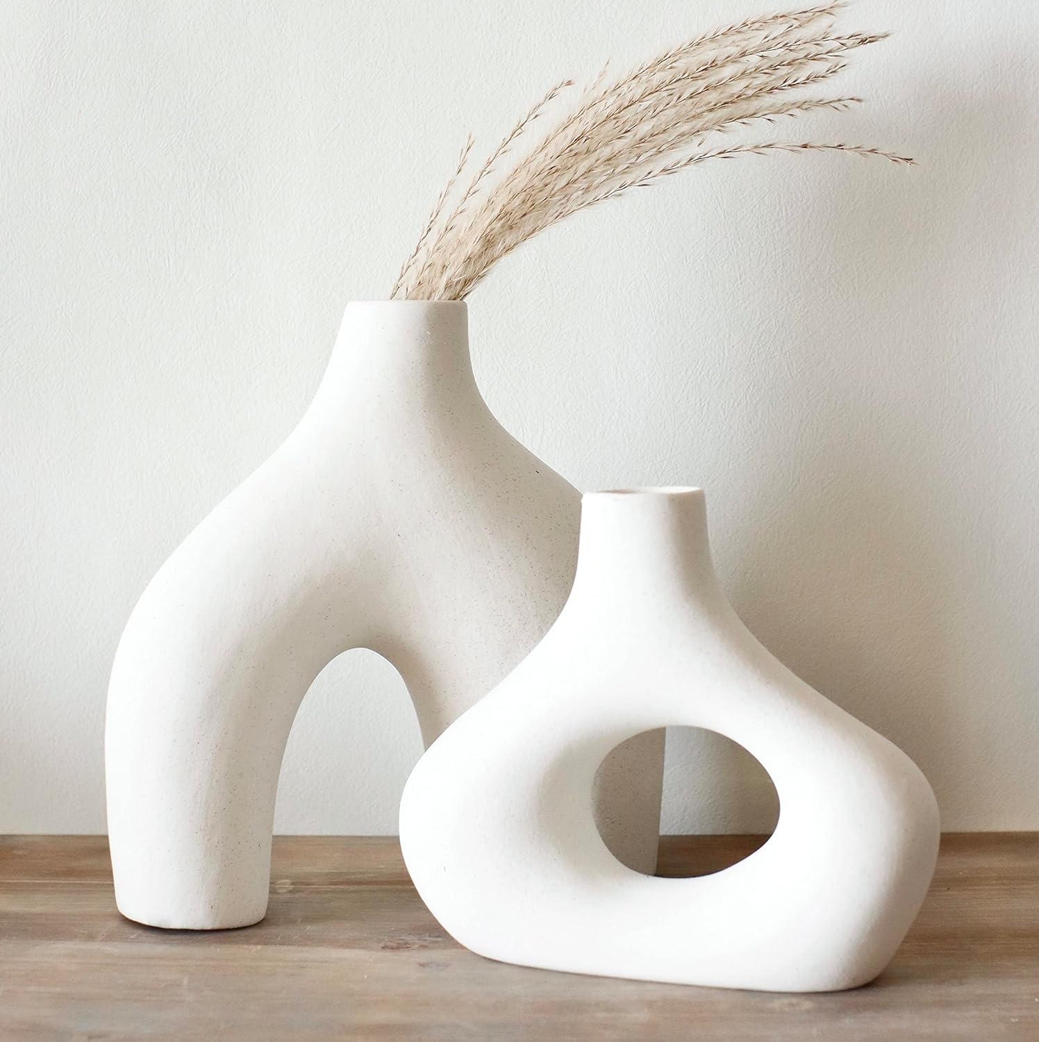 Showcases the product in a stylish, minimalist home setting to appeal to design-conscious shoppers.