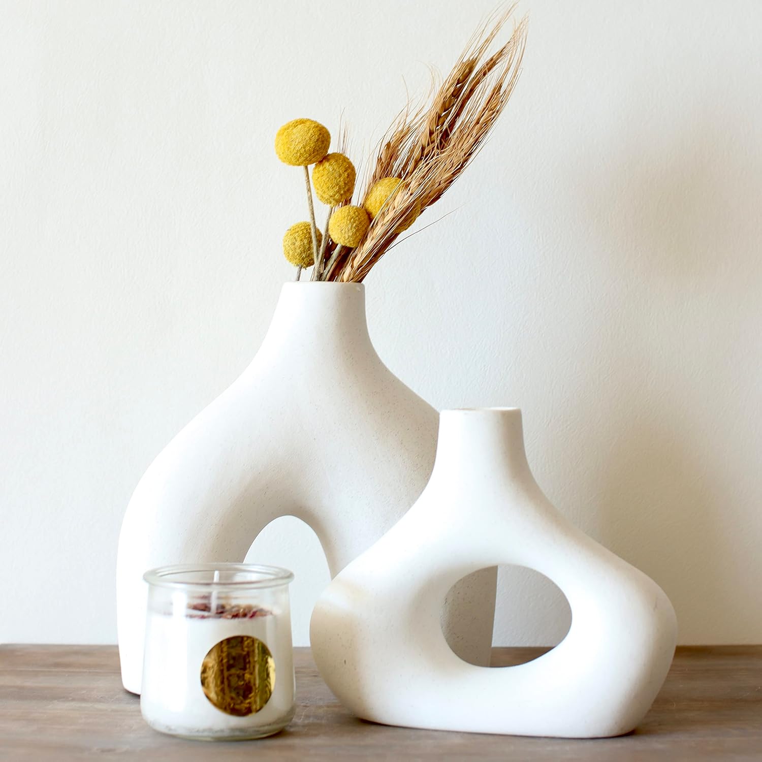 Showcases the product in a stylish, minimalist home setting to appeal to design-conscious consumers.