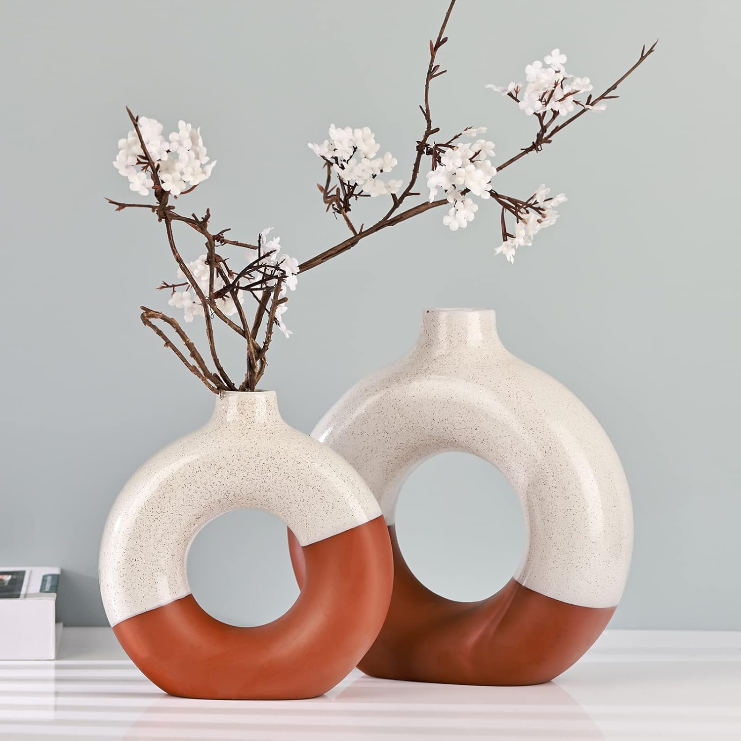 Showcases the product in a stylish, minimalist home setting to appeal to design-conscious shoppers.
