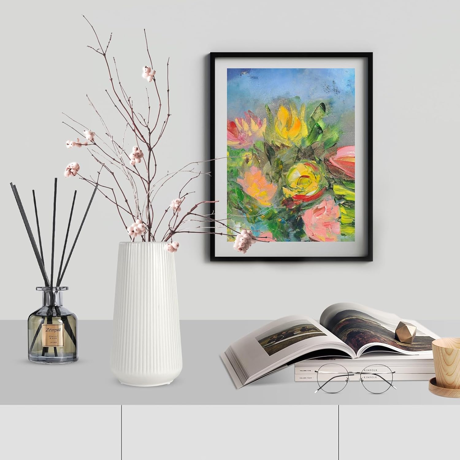 Shows how the product (framed artwork) can be incorporated into a stylish home setting to enhance the decor.