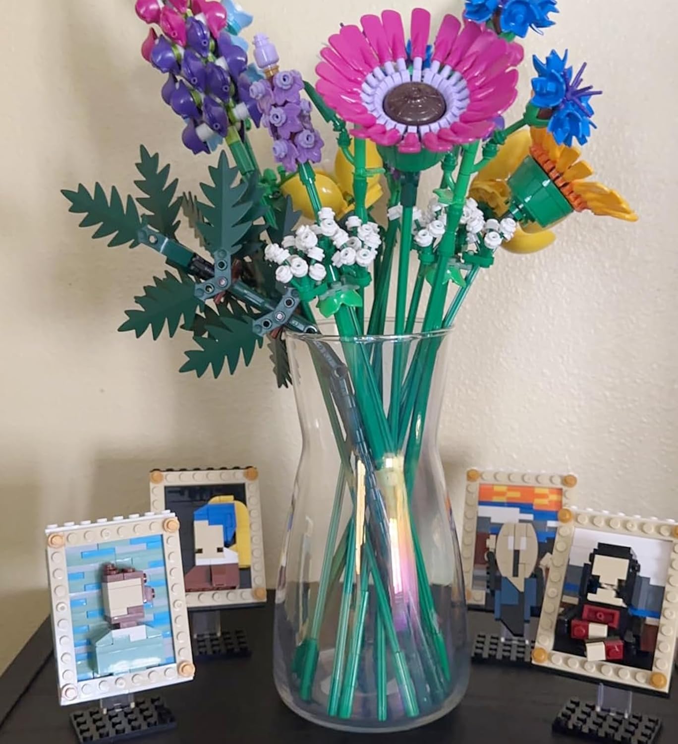Shows the completed LEGO flower bouquet set, demonstrating the variety of flowers and colors included in the product.