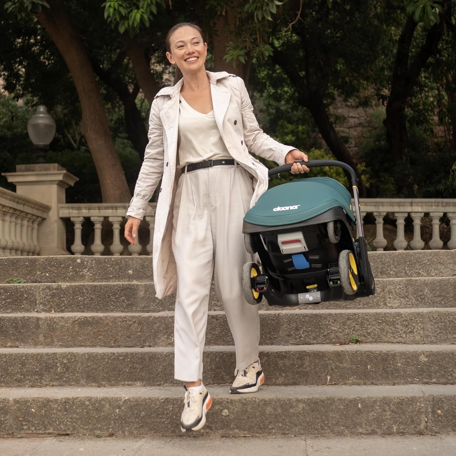 Shows the stroller's lightweight and portable design in a real-world setting, emphasizing how easy it is for parents to use while out and about.