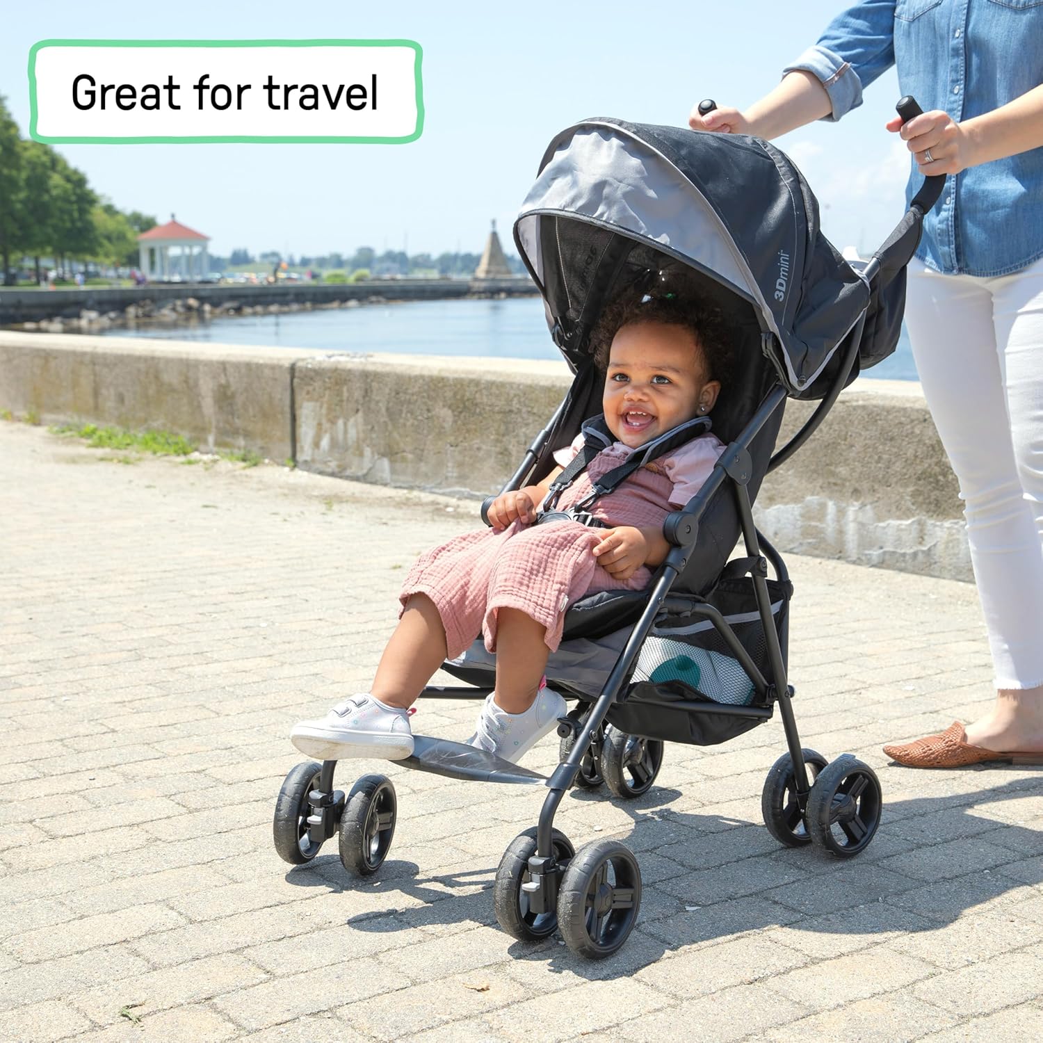 Demonstrates the stroller's suitability for travel and outdoor use, showing its convenience for parents on-the-go.