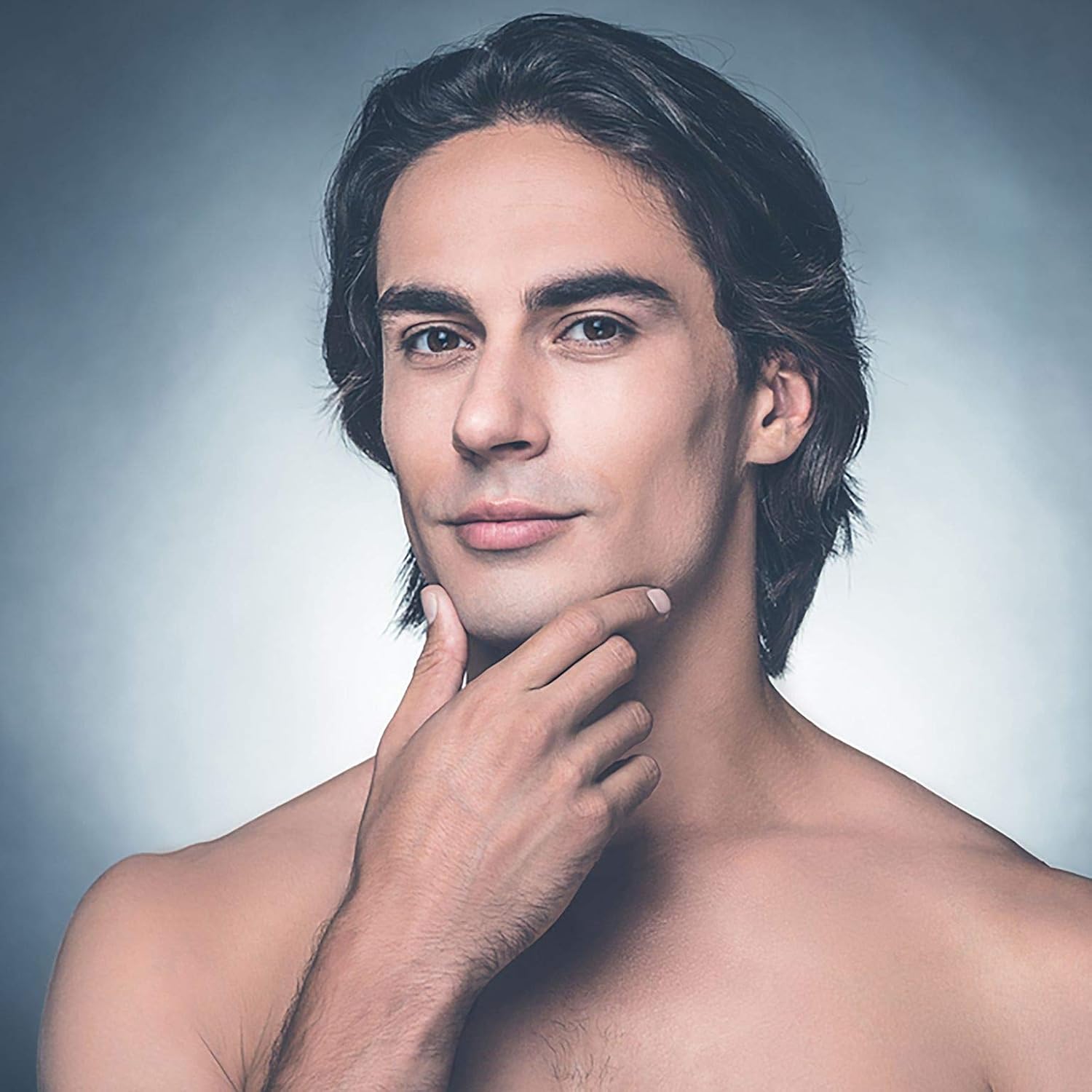 Showcases a model with clear, healthy-looking skin to demonstrate the potential results of using the product.