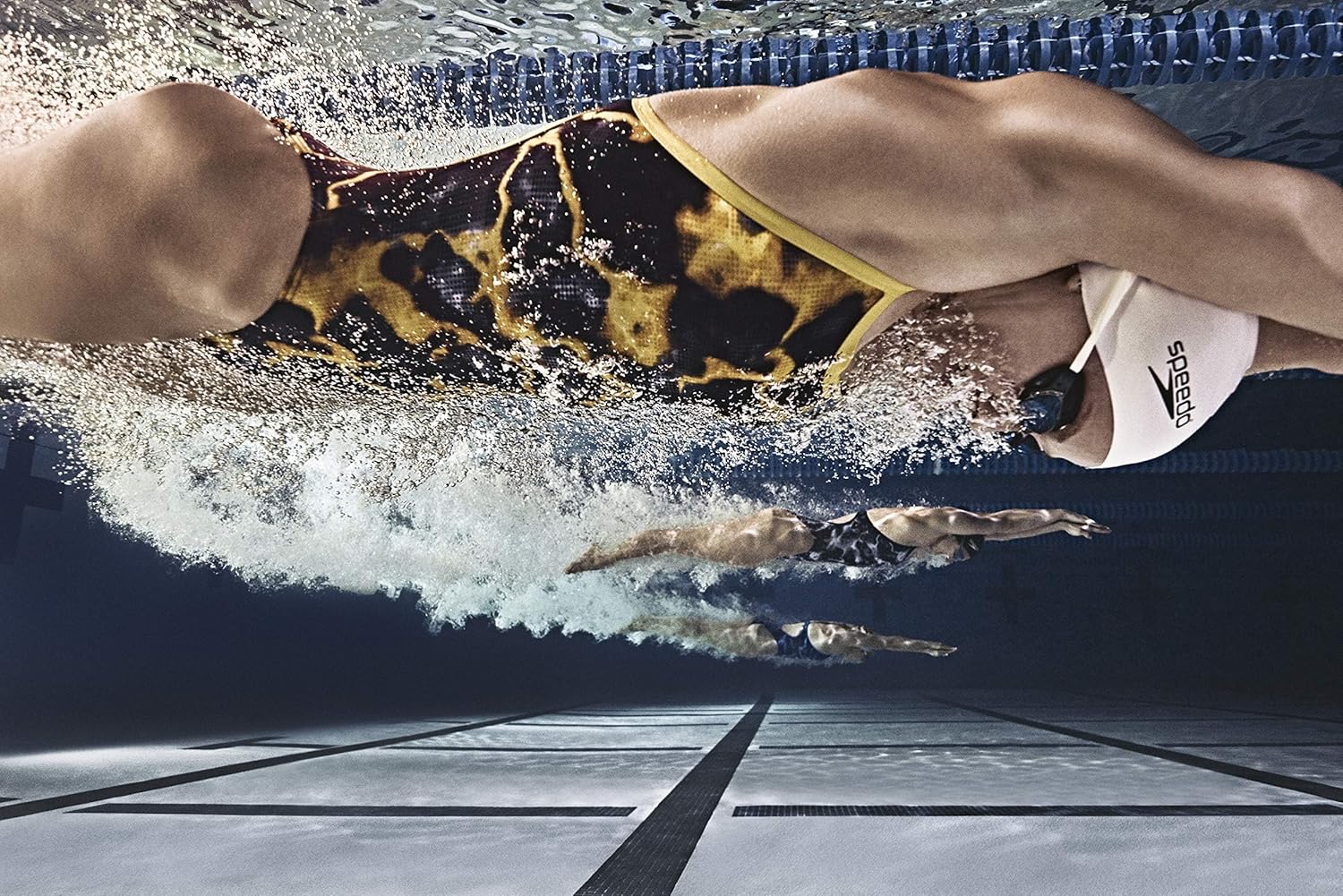 Showcases the product in action during competitive swimming, emphasizing its suitability for professional athletes.