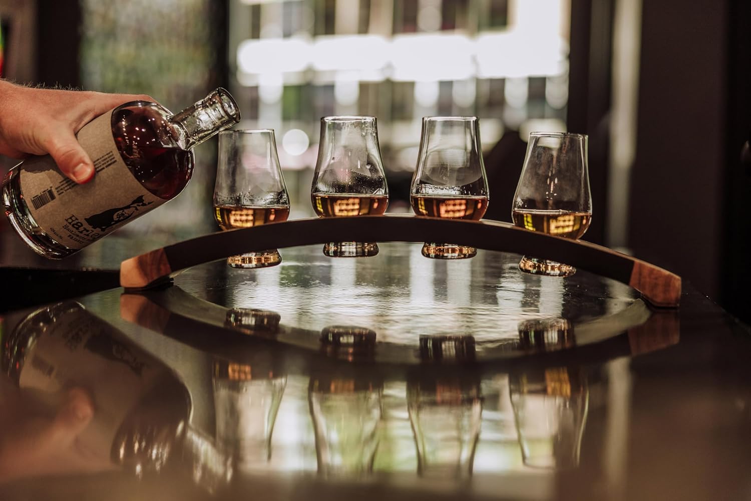 Showcases the product in use, demonstrating how it enhances the whiskey tasting experience and creates an elegant, social atmosphere.